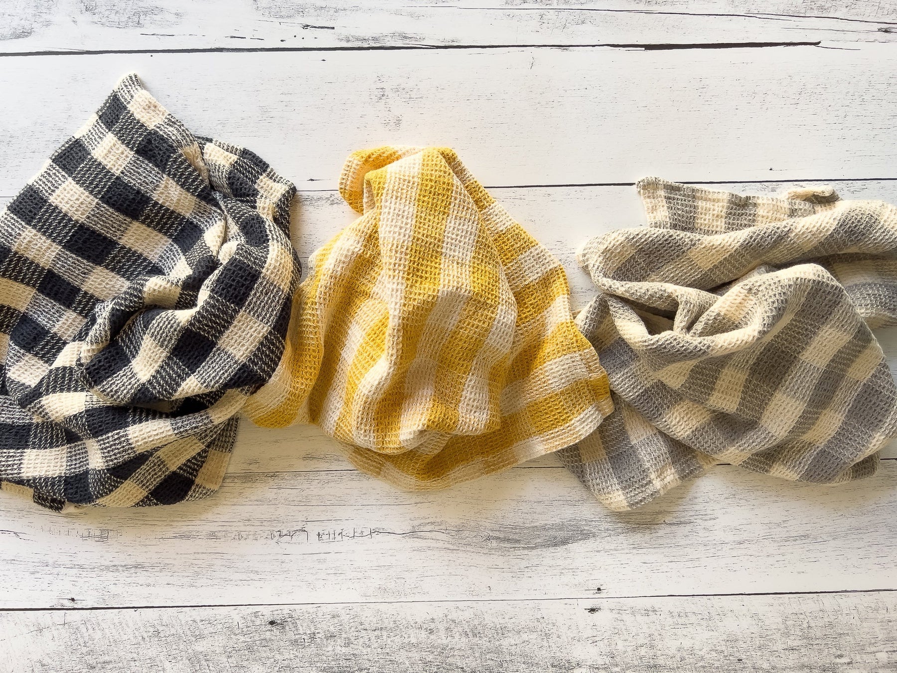 https://stellastable.com/cdn/shop/products/waffled_dish_towel_checkered_collection_1800x1800.jpg?v=1669131085